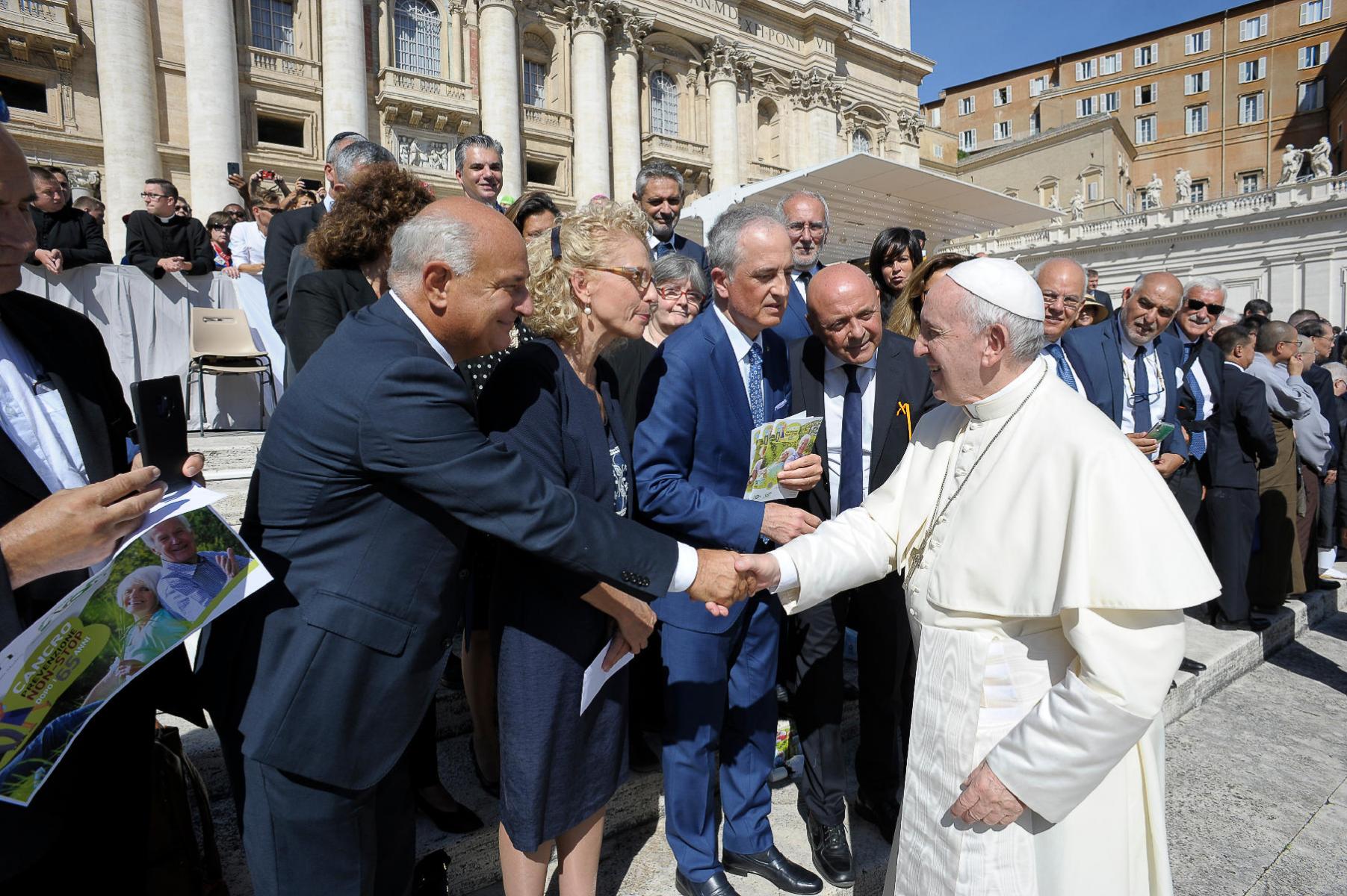 AIOM representatives meeting Pope Francis outside the Vatican