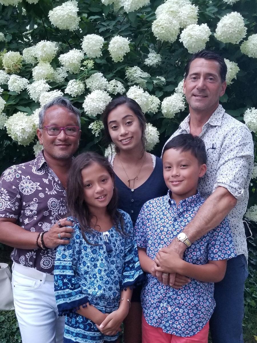 Dr. Dizon, his spouse, and their children.