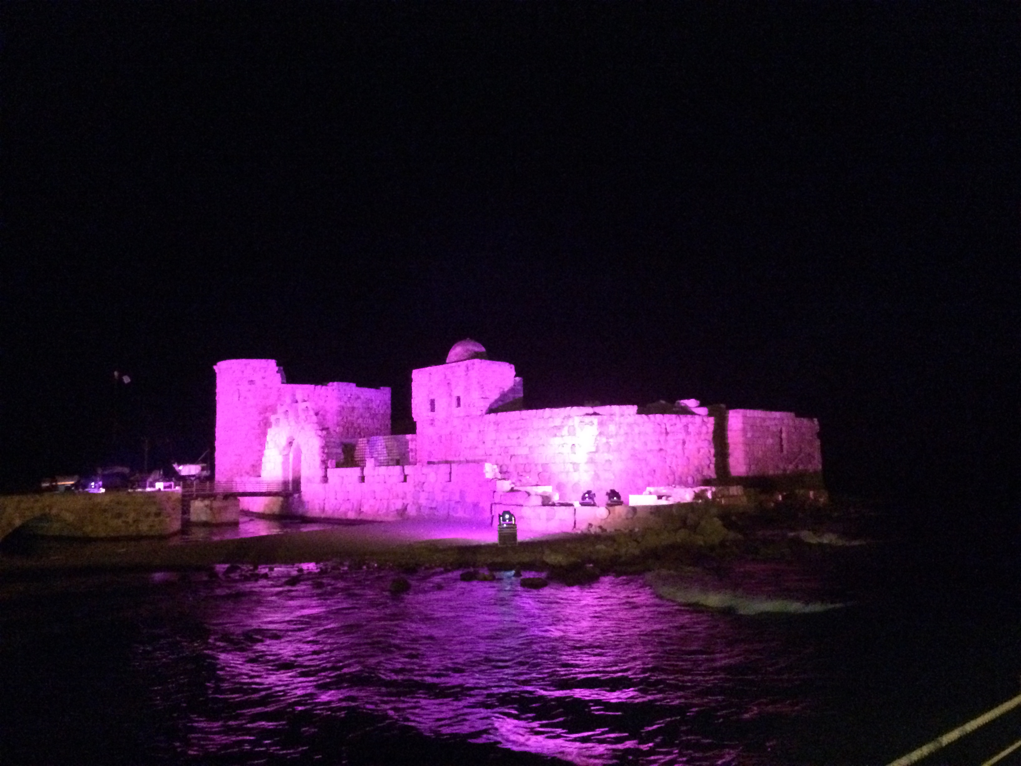 Sidon Sea Castle lit up with pink lights