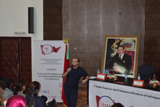 Dr. Khalid El Bairi gives a presentation on academic publishing best practices.
