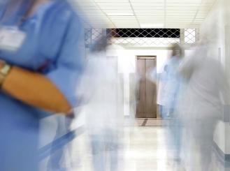 doctors walking in an interior corridor