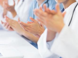 group of doctors clapping