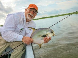 Dr. Penley on a fishing trip in Belize