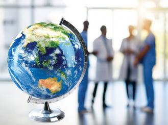 Stock image of doctors and a globe