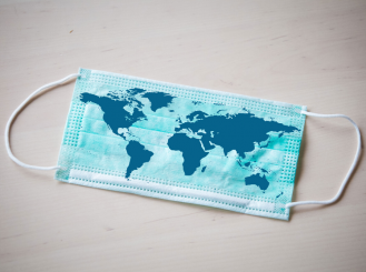 surgical mask with world map printed on it