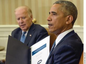 Photo of President Obama and Vice President Biden with a summary of Cancer Moonshot Report