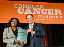 Dr. Rogers with Dr. Thomas G. Roberts, Jr., at the Conquer Cancer Grants and Awards Ceremony at the 2016 ASCO Annual Meeting.