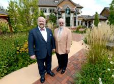 Dr. Charles von Gunten and Dr. Frank Ferris in a garden
