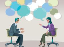 Stock graphic of man and woman talking with speech bubbles above their heads