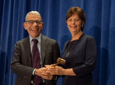 Dr. Eric P. Winer passes the presidential gavel to Dr. Lynn M. Schuchter.